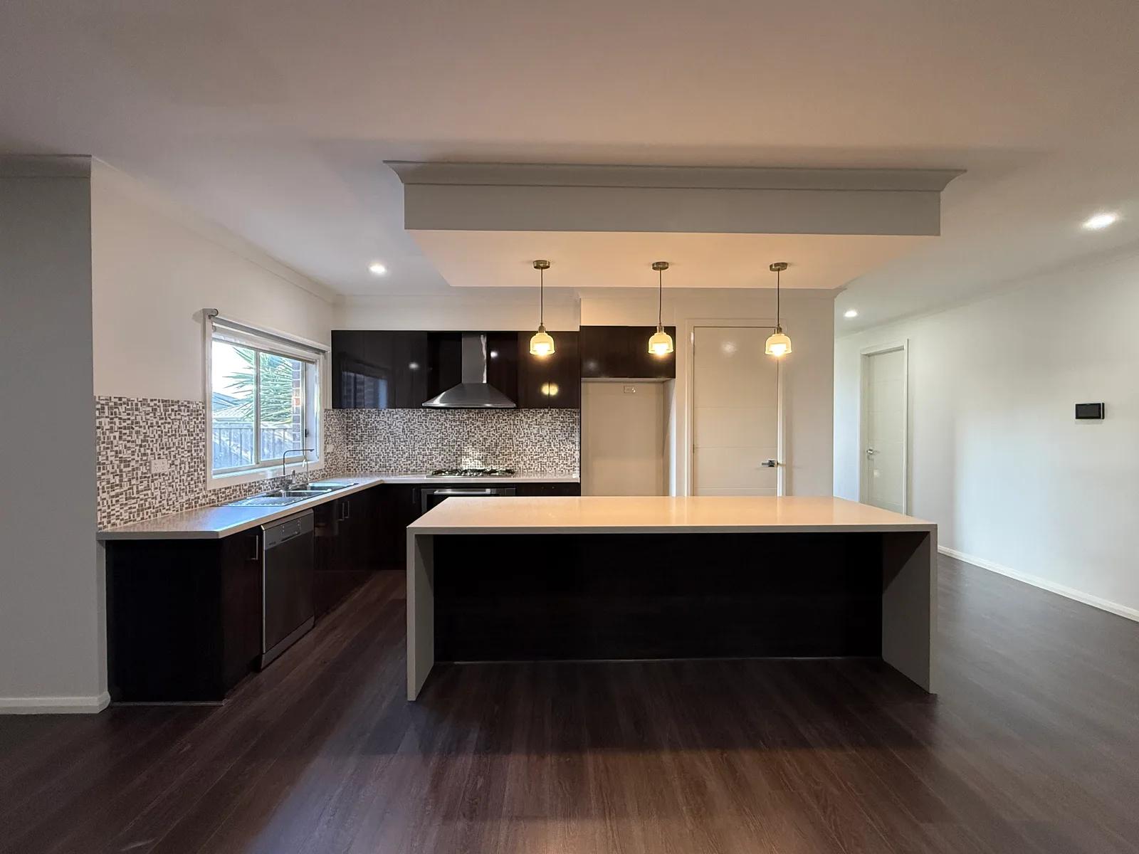 Same kitchen photo after AI enhancement with brighter, clearer presentation before